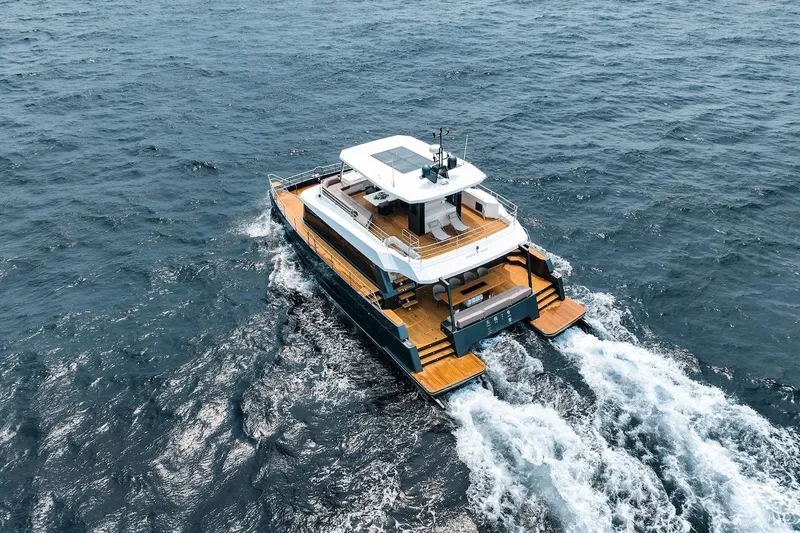 Slide: The Image of 2024 Catamaran Diamond Yachts EF56 cruising on open water. - 6