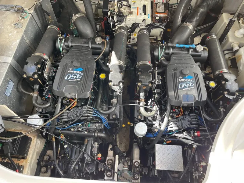 Slide: The Image of Engine compartment of a 2005 Sea Ray 320 Sundancer with twin MerCruiser 350 engines. - 15