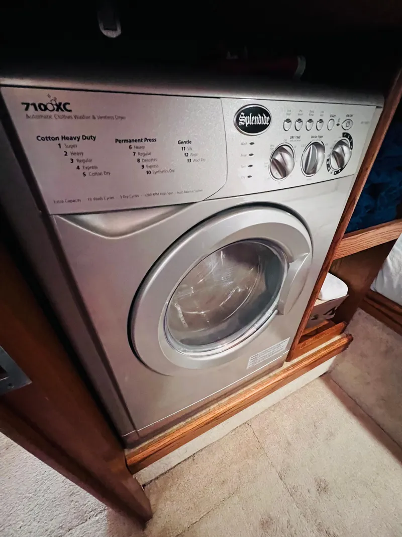 Slide: The Image of Splendide washer-dryer in 1987 Carver 4227 Cockpit Motor Yacht interior. - 28