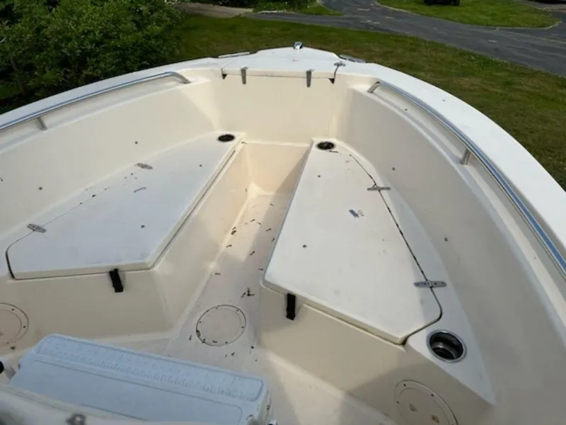 Slide: The Image of 2016 Grady-White 209 Fisherman boat interior with seating and storage compartments. - 8