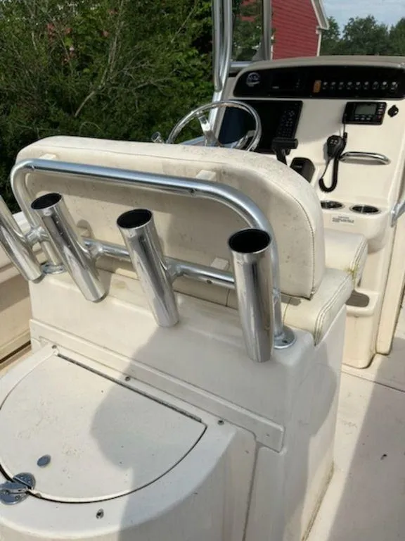 Slide: The Image of 2016 Grady-White 209 Fisherman boat console with rod holders and steering wheel. - 9