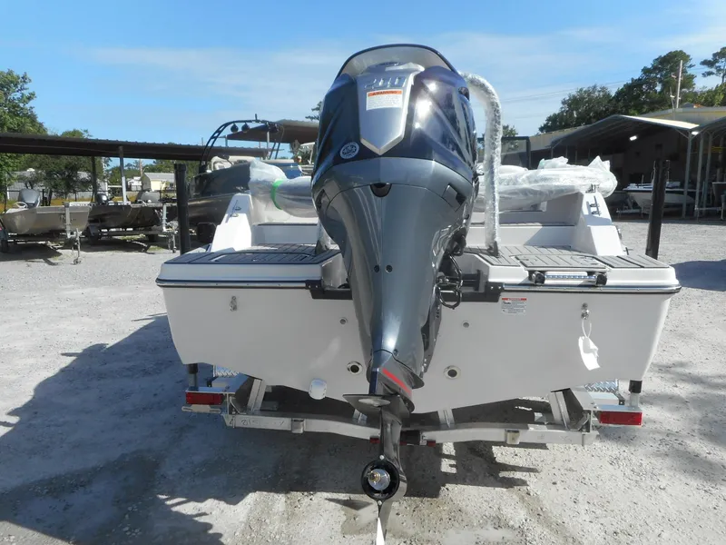 Slide: The Image of 2024 Starcraft SVX 210 OB DC boat with outboard motor, rear view. - 16