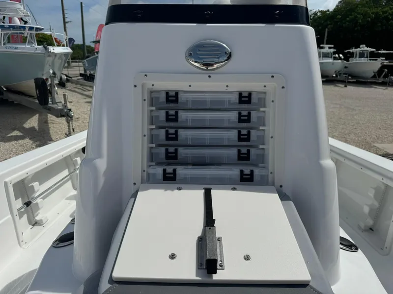 Slide: The Image of 2025 NauticStar 224 Bay boat with organized tackle storage system. - 10
