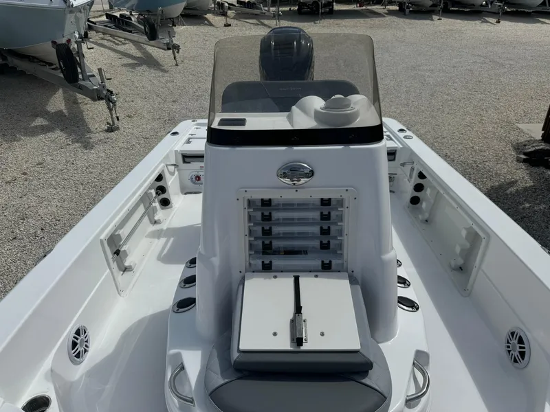 Slide: The Image of 2025 NauticStar 224 Bay boat interior with console and seating. - 9