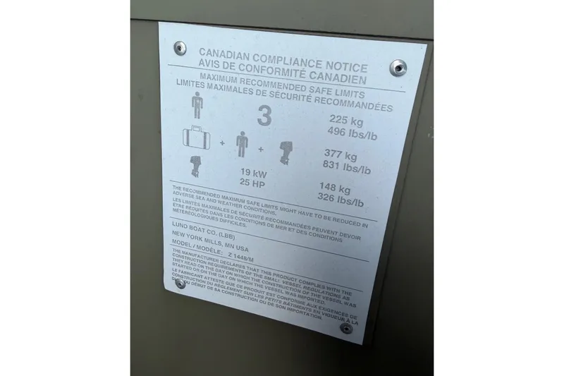 Slide: The Image of U.S. Coast Guard capacity label for 2024 Lund 1448M boat, 4 persons or 500 lbs. - 6
