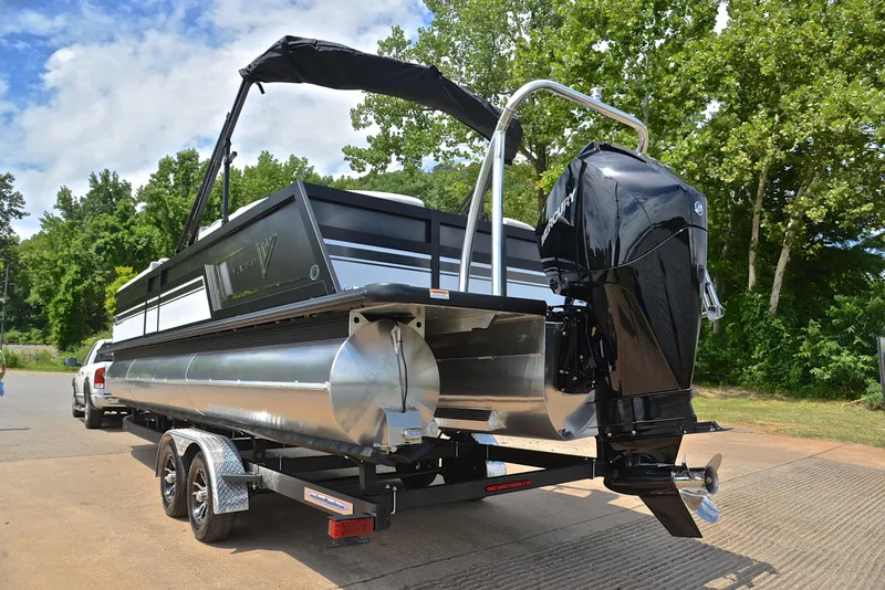 Slide: The Image of 2023 Viaggio Diamante 26 U Platinum pontoon boat on trailer with outboard motor. - 12