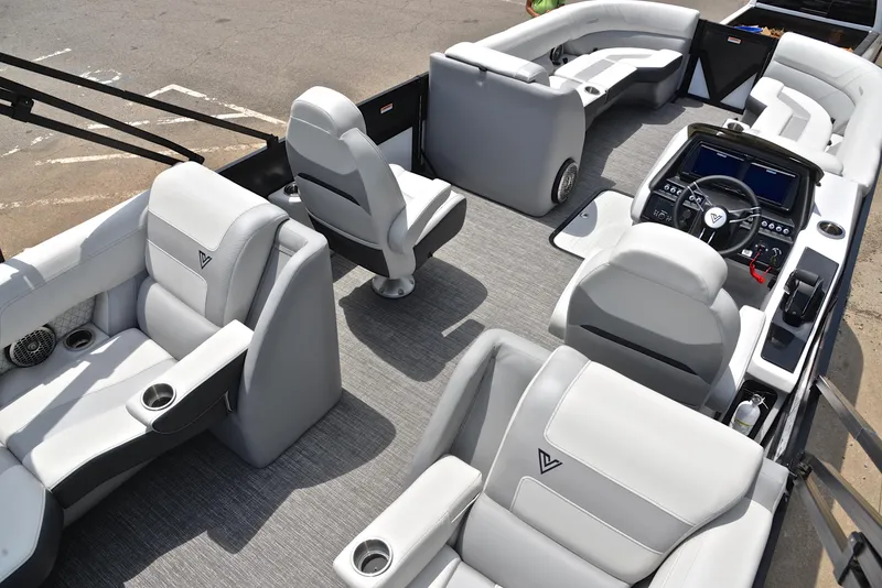 Slide: The Image of 2023 Viaggio Diamante 26 U Platinum boat interior with luxurious seating and modern dashboard. - 19