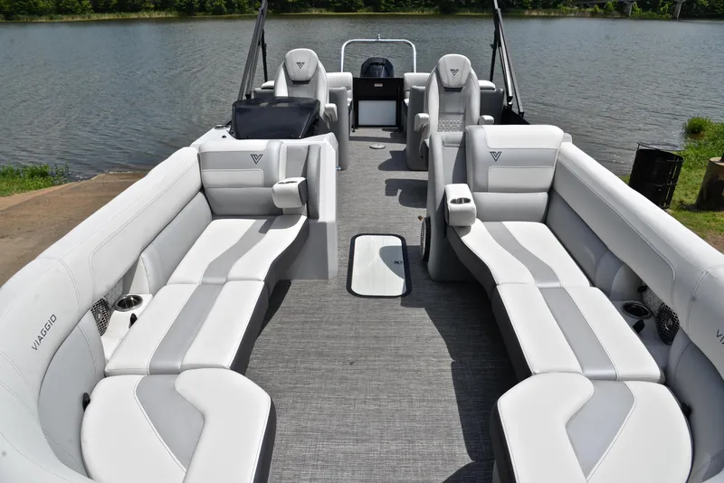 Slide: The Image of 2023 Viaggio Diamante 26 U Platinum pontoon boat with luxurious seating on a lake. - 20
