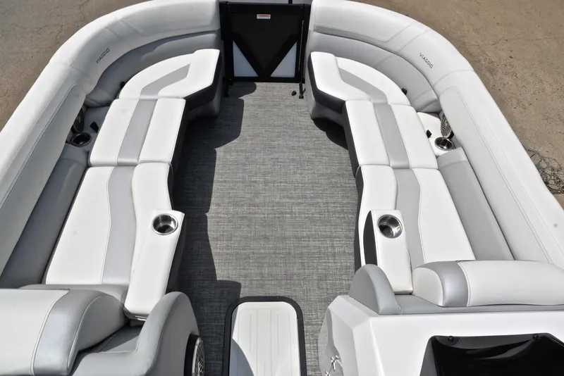 Slide: The Image of 2023 Viaggio Diamante 26 U Platinum boat interior with luxurious seating and cup holders. - 21