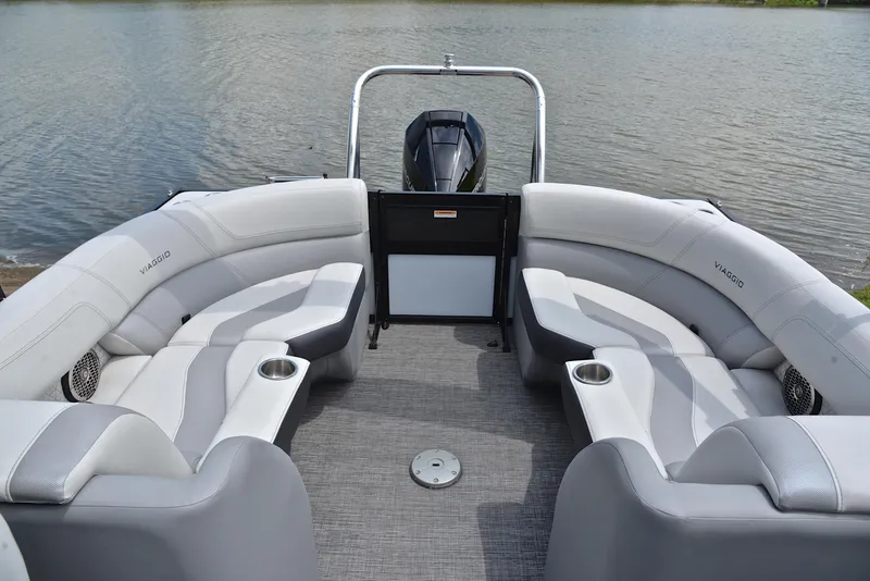 Slide: The Image of 2023 Viaggio Diamante 26 U Platinum boat with luxurious seating on a calm lake. - 24
