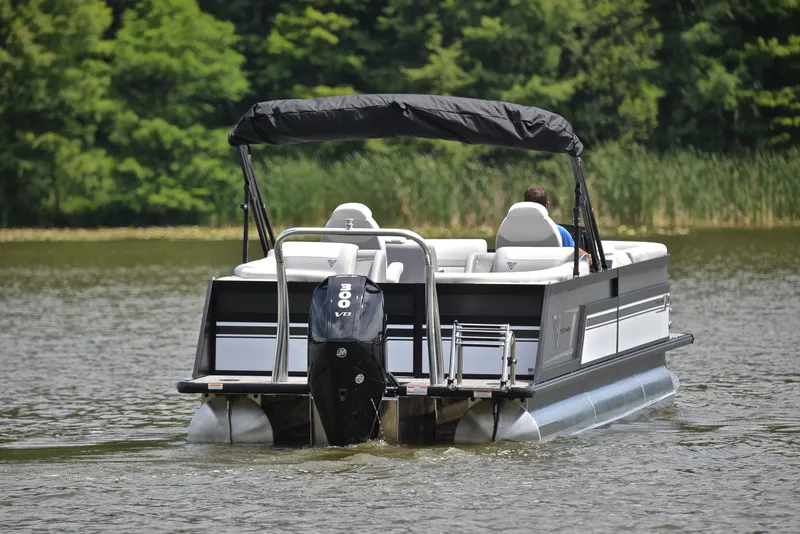 Slide: The Image of 2023 Viaggio Diamante 26 U Platinum pontoon boat cruising on a lake. - 7