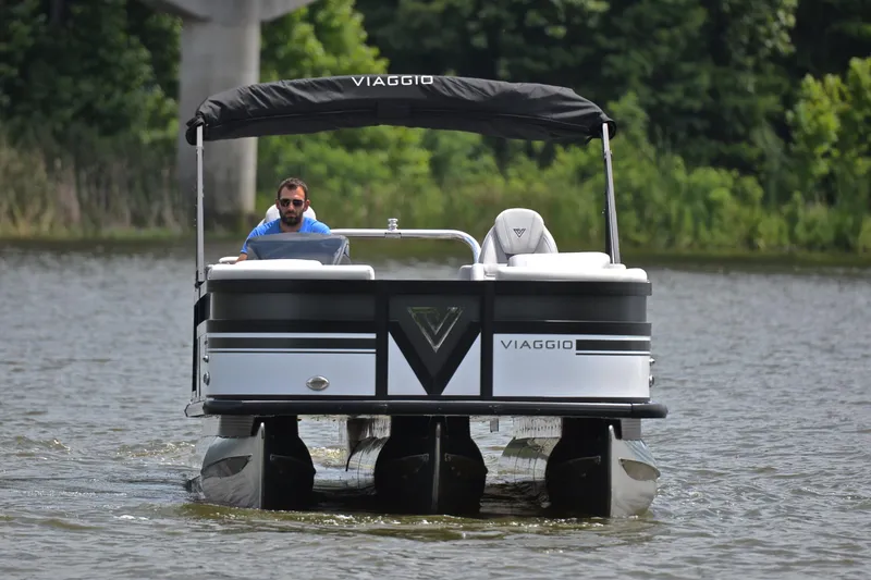 Slide: The Image of 2023 Viaggio Diamante 26 U Platinum pontoon boat on a lake. - 8