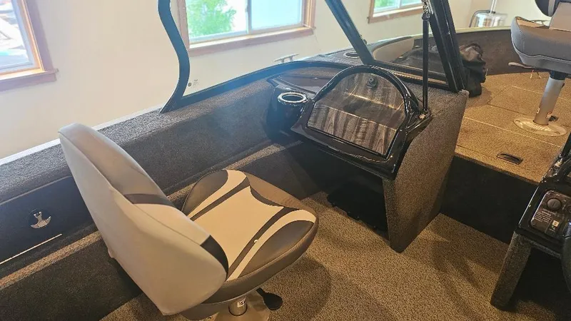 Slide: The Image of Interior of 2025 Starcraft FUSION 16 DC boat with seating and dashboard. - 4