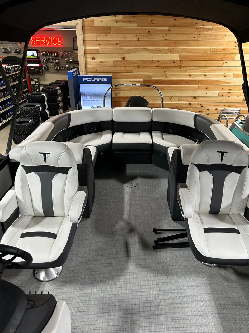 Slide: The Image of 2024 Trifecta 22RFCS boat interior with plush seating and modern design. - 6