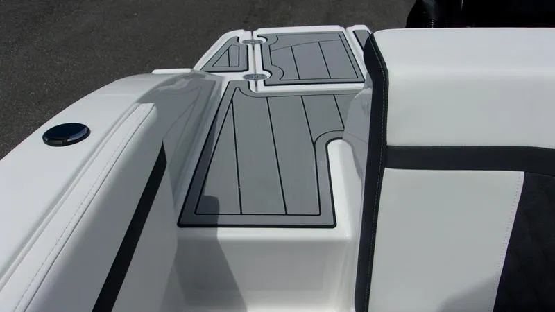 Slide: The Image of 2025 Monterey M 205 boat deck with sleek gray and white design. - 11