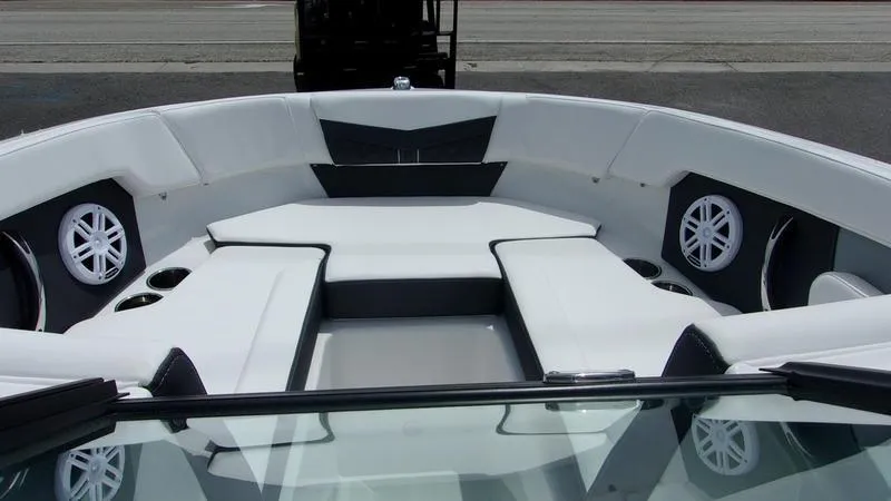 Slide: The Image of 2025 Monterey M 205 boat interior with white seating and speakers. - 9