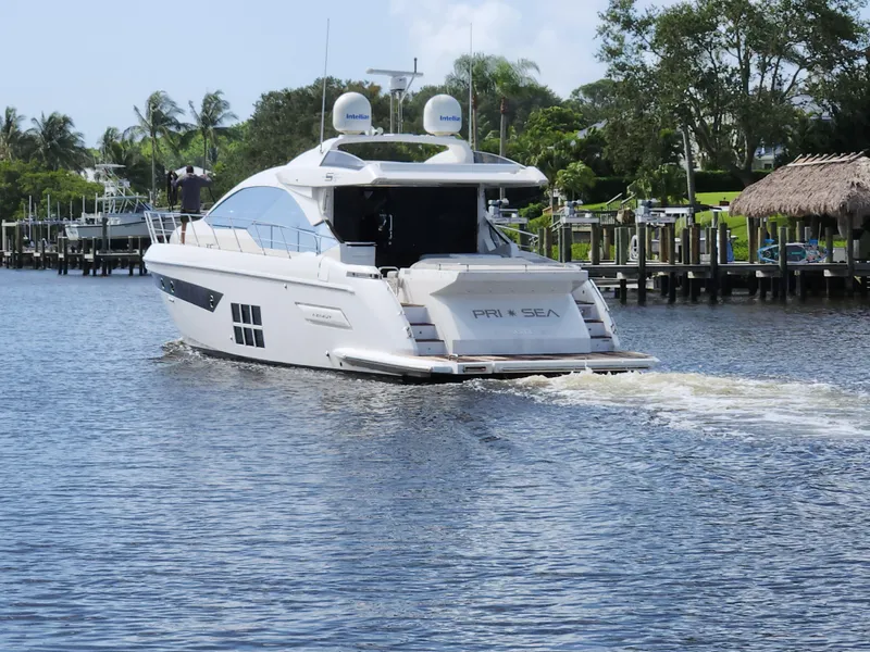 Slide: The Image of Azimut S6 2019 luxury yacht cruising on a scenic waterway. - 1