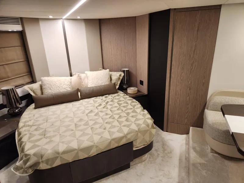 Slide: The Image of Luxurious bedroom interior of 2019 Azimut S6 yacht with modern design and elegant furnishings. - 11