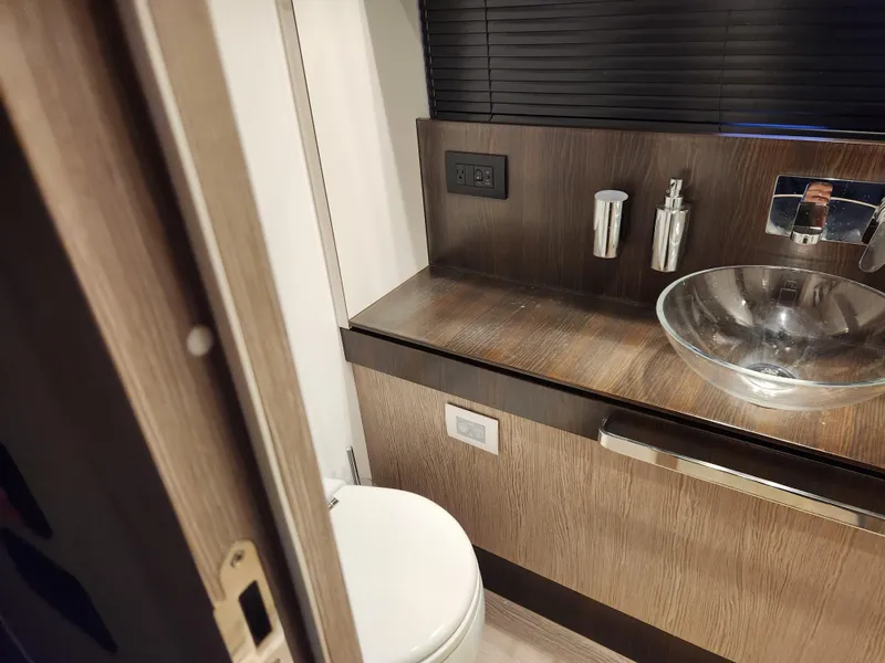 Slide: The Image of Luxurious 2019 Azimut S6 yacht bathroom with modern fixtures and elegant design. - 16