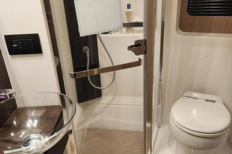 Slide: The Image of Luxurious bathroom in 2019 Azimut S6 yacht with glass sink and shower. - 21