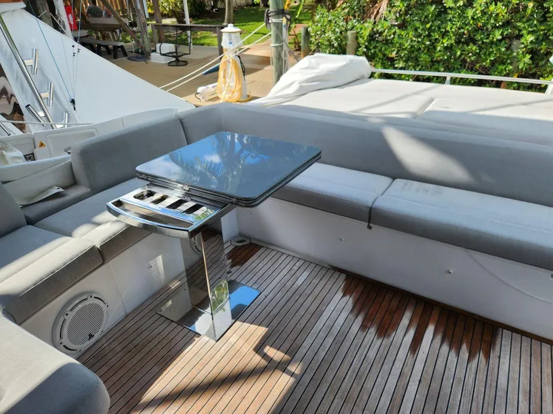 Slide: The Image of Luxurious 2019 Azimut S6 yacht deck with sleek seating and modern table. - 30
