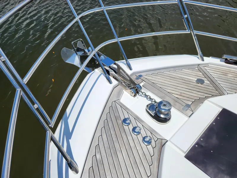 Slide: The Image of Azimut S6 2019 yacht bow with anchor and teak decking. - 33