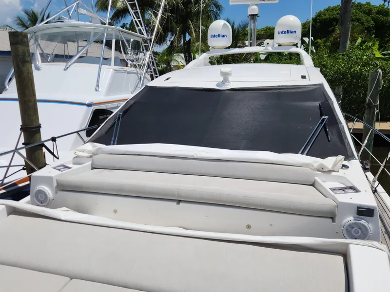 Slide: The Image of 2019 Azimut S6 yacht with sun deck and radar domes, docked in a marina. - 34