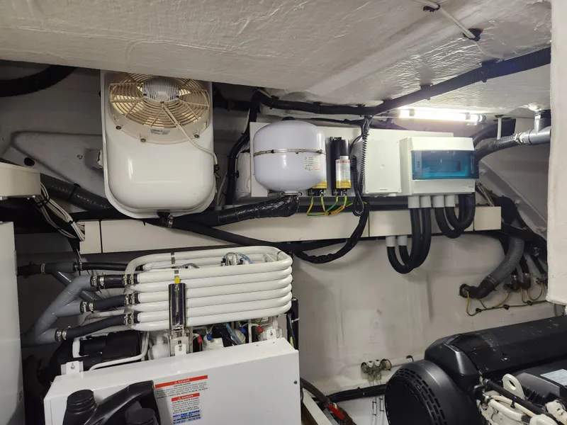 Slide: The Image of Engine room of 2019 Azimut S6 yacht with mechanical equipment and wiring. - 38
