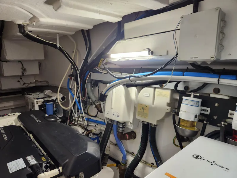 Slide: The Image of Engine room of 2019 Azimut S6 yacht with visible machinery and wiring. - 41