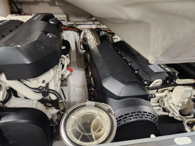 Slide: The Image of Engine compartment of a 2019 Azimut S6 yacht, showcasing mechanical components. - 44