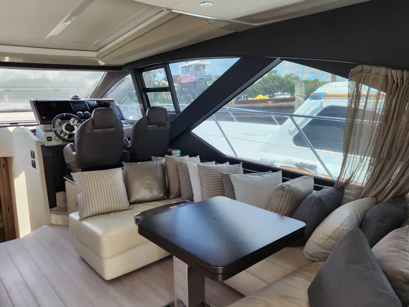 Slide: The Image of Luxurious interior of 2019 Azimut S6 yacht with plush seating and modern helm. - 6