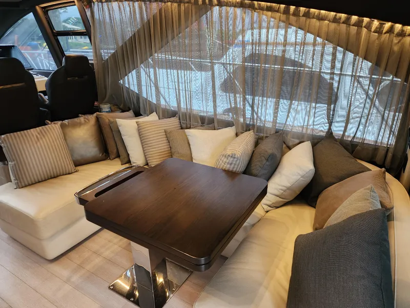 Slide: The Image of Luxurious interior of 2019 Azimut S6 yacht with elegant seating and table. - 8