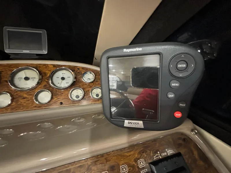 Slide: The Image of Close-up of the dashboard and Raymarine display on a 2000 Bayliner 3788 Command Bridge Motoryacht. - 13