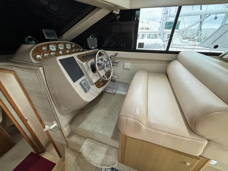 Slide: The Image of Interior helm station of 2000 Bayliner 3788 Command Bridge Motoryacht with leather seating. - 19