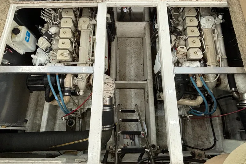 Slide: The Image of Engine room of a 2000 Bayliner 3788 Command Bridge Motoryacht showing twin engines. - 29