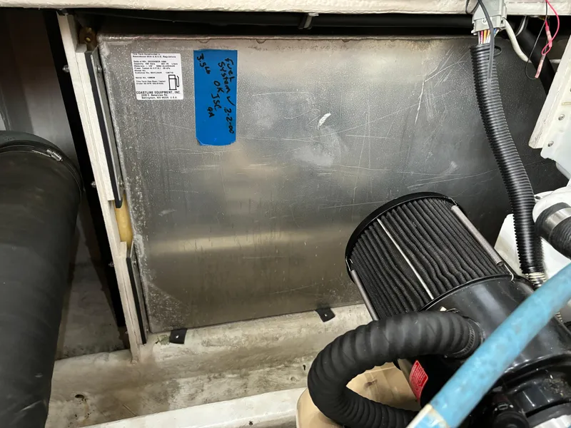 Slide: The Image of Engine compartment of a 2000 Bayliner 3788 Command Bridge Motoryacht. - 33