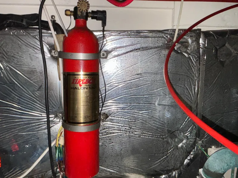 Slide: The Image of Fire extinguisher in the engine room of a 2000 Bayliner 3788 Command Bridge Motoryacht. - 38