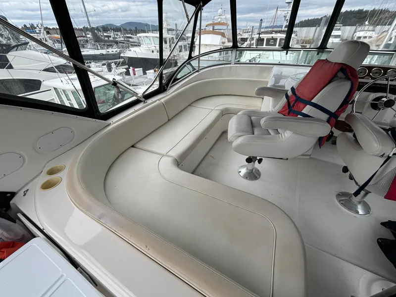 Slide: The Image of Interior of 2000 Bayliner 3788 Command Bridge Motoryacht with seating and helm station. - 41