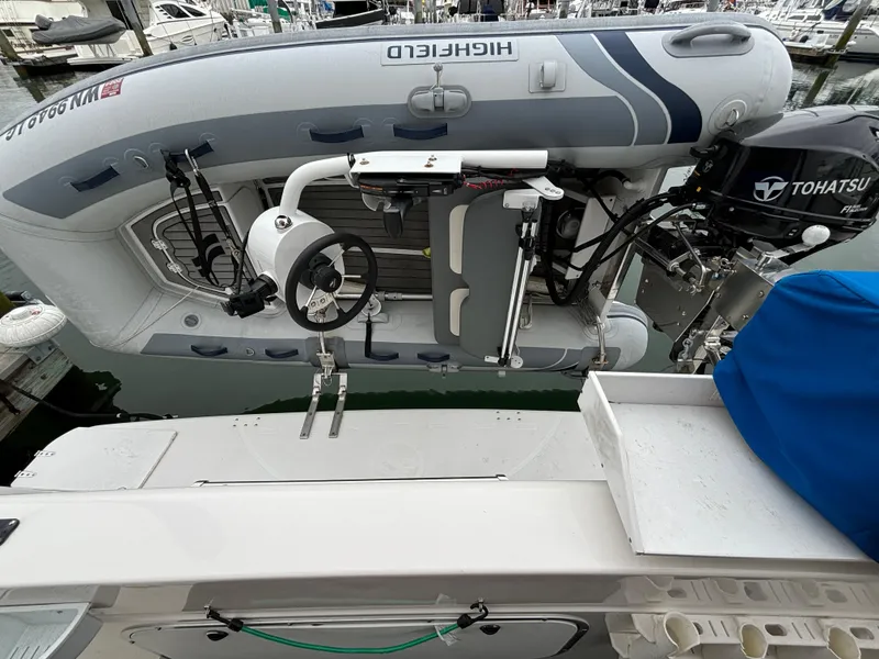 Slide: The Image of Bayliner 3788 Command Bridge Motoryacht 2000 with Highfield dinghy and Tohatsu outboard motor. - 8