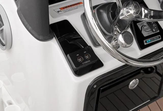 Slide: The Image of Close-up of the 2024 Yamaha Boats 255 FSH Sport H steering console. - 19