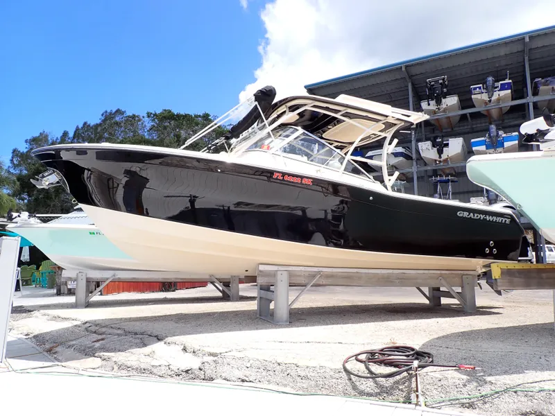 Slide: The Image of 2019 Grady-White Freedom 275 boat on dry dock. - 0