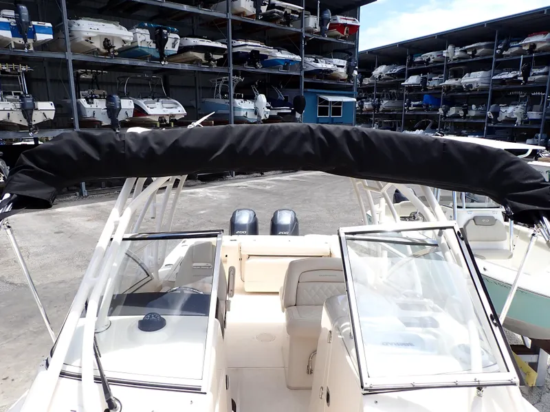 Slide: The Image of 2019 Grady-White Freedom 275 boat in storage facility. - 16
