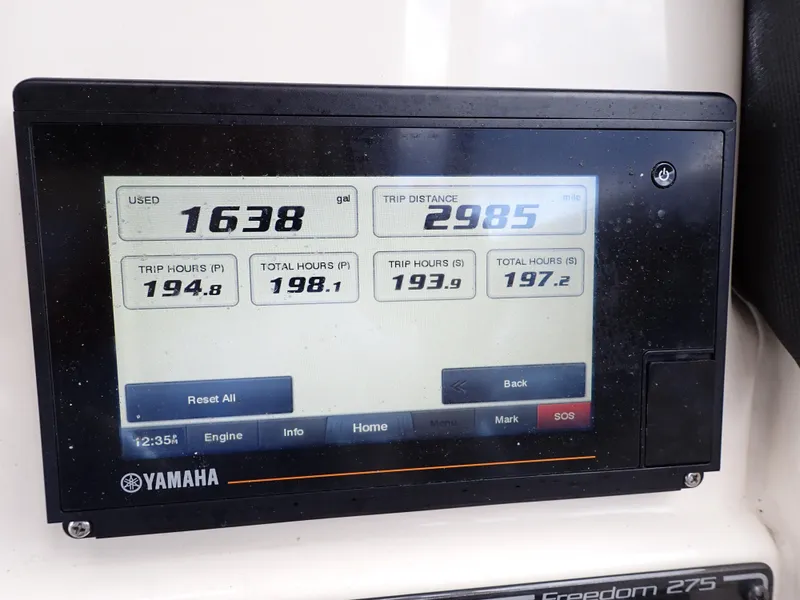 Slide: The Image of Yamaha engine display on 2019 Grady-White Freedom 275 showing trip data and engine hours. - 20