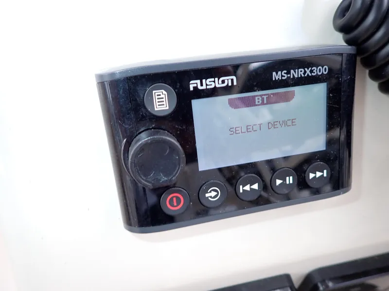 Slide: The Image of Fusion MS-NRX300 control panel on 2019 Grady-White Freedom 275 boat. - 22