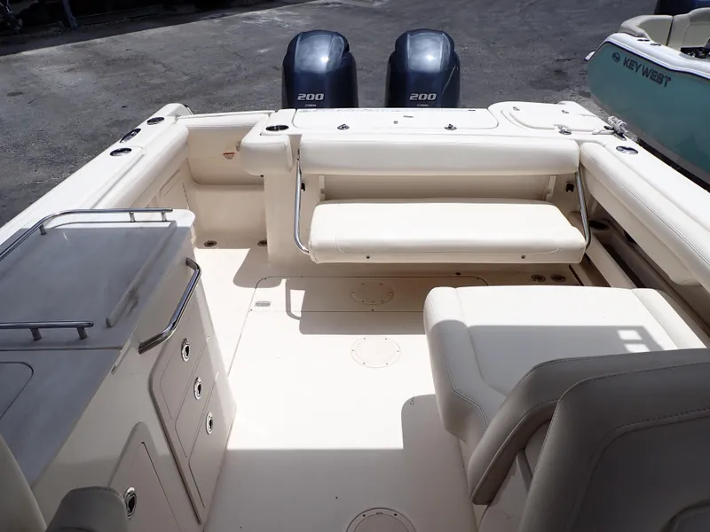 Slide: The Image of 2019 Grady-White Freedom 275 boat interior with dual 200 HP engines. - 5