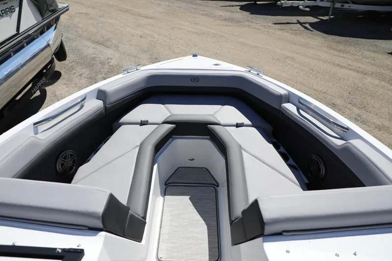 Slide: The Image of 2024 Cobalt R4 boat interior with sleek gray seating and modern design. - 8