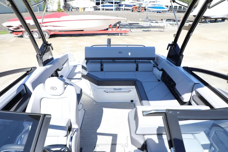 Slide: The Image of 2024 Cobalt R4 boat interior with sleek seating and modern design. - 9