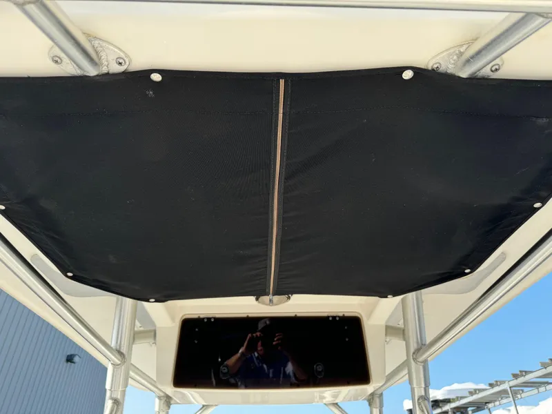 Slide: The Image of 2007 Boston Whaler 270 Outrage T-top with black canvas cover. - 15