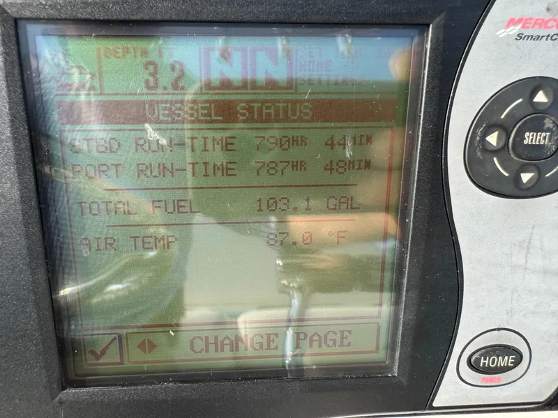 Slide: The Image of 2007 Boston Whaler 270 Outrage vessel status display showing engine run-time and fuel levels. - 17