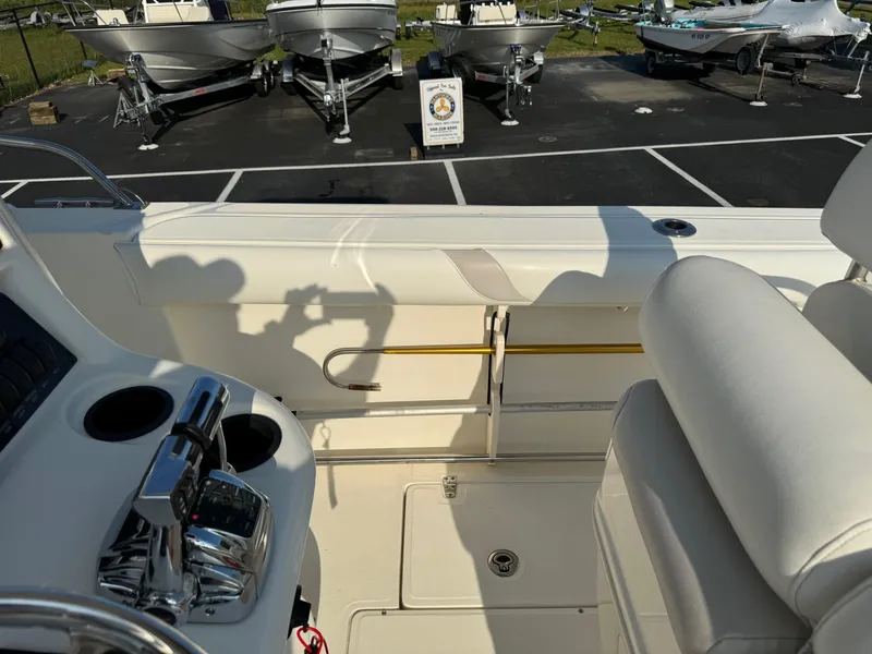 Slide: The Image of 2007 Boston Whaler 270 Outrage interior with control panel and seating. - 20